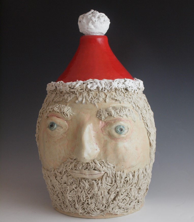 Stoneware face jug Santa Claus. Each hair was extruded and individually apllied